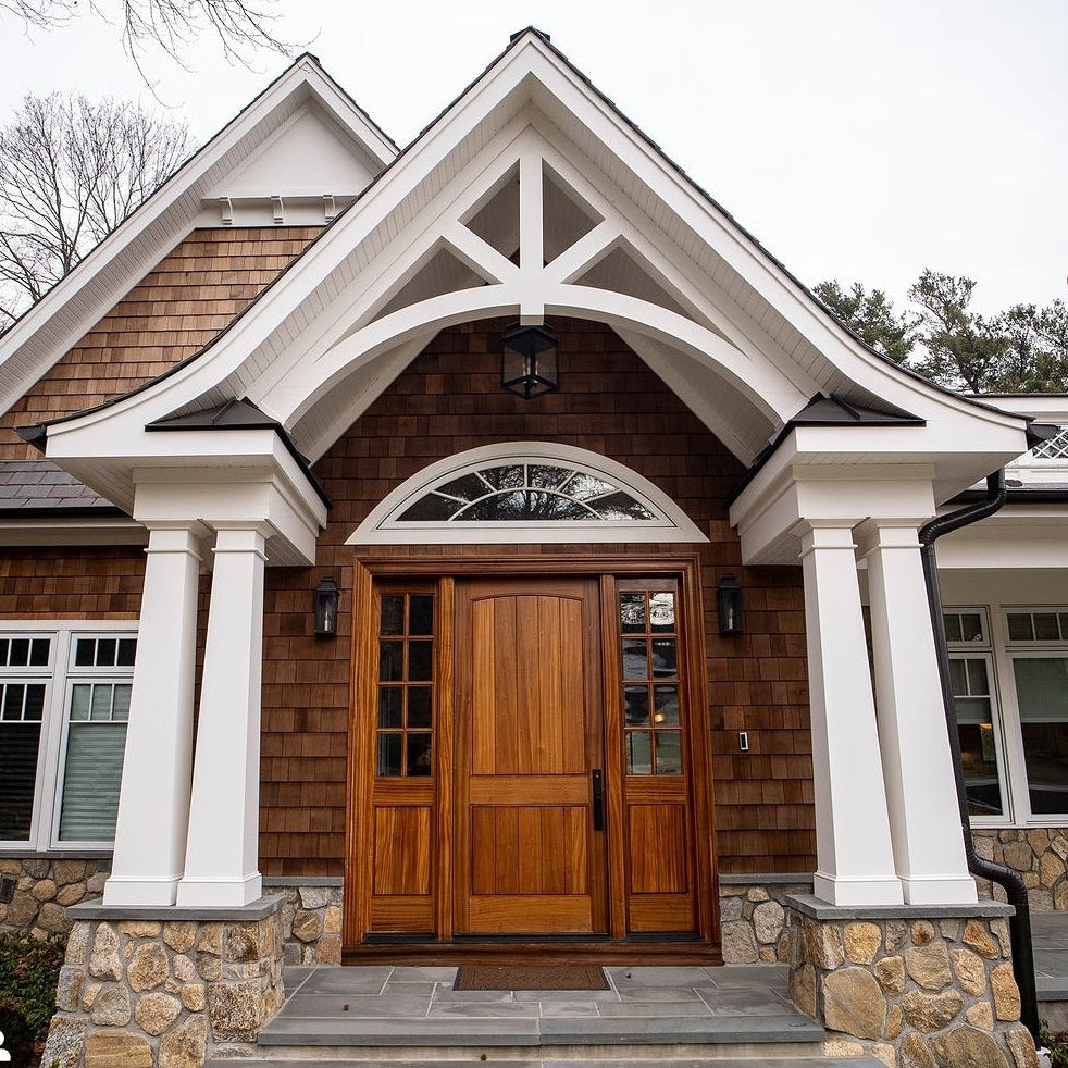 Front entrance of a house with tapered PVC columns and decorative PVC Truss